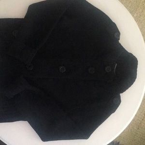 Black Carlisle cardigan sweater.